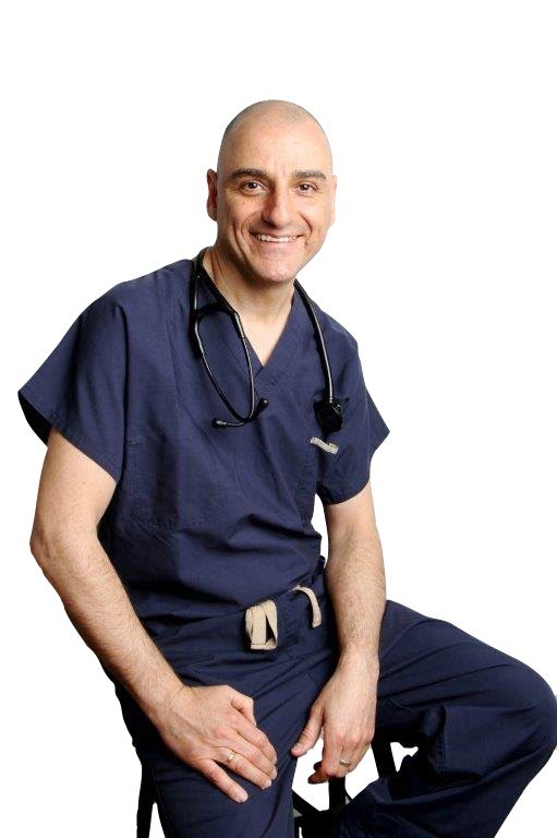 Smiling doctor in navy scrubs with stethoscope