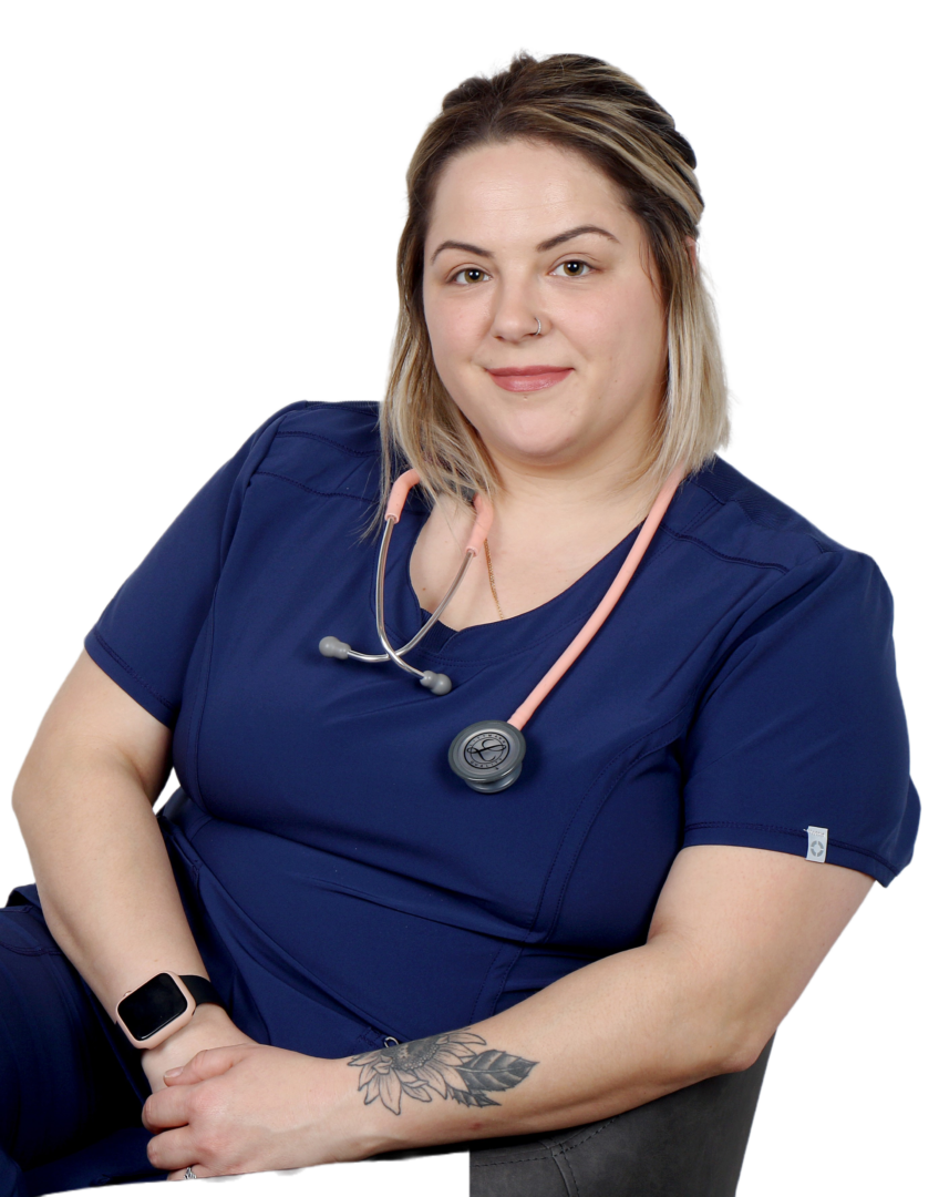 Healthcare worker in navy scrubs with stethoscope